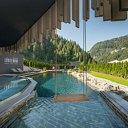 The outdoor pool in the adults-only area at the Lürzerhof wellness hotel in Salzburg
