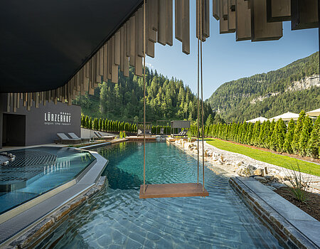 The outdoor pool in the adults-only area at the Lürzerhof wellness hotel in Salzburg