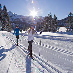 Cross-country skiers on a cross-country skiing vacation in Austria