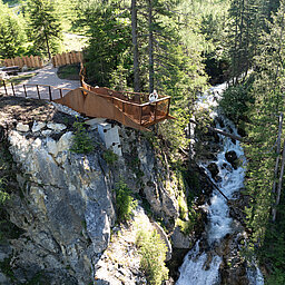 A woman on the viewing platform above Johannes Waterfall