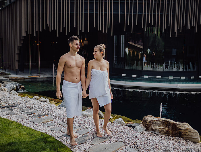 A couple walks through the adults-only area at the Lürzerhof wellness hotel in Salzburg.
