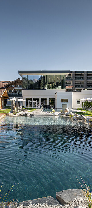 The mountain lake pool at the LÃ¼rzerhof wellness hotel in Salzburg
