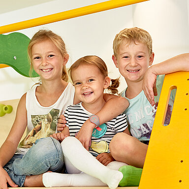 Children play in the play area of the Lürzerhof, the family hotel in Austria for vacations with children.