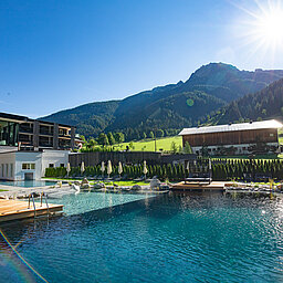 The mountain lake pool at the Lürzerhof wellness hotel in Salzburg
