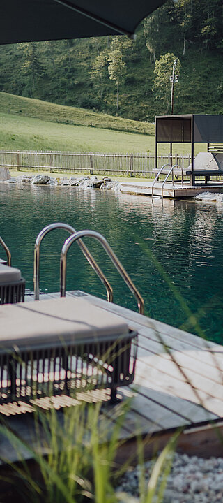 The mountain lake pool at the LÃ¼rzerhof Wellness Hotel in Salzburg