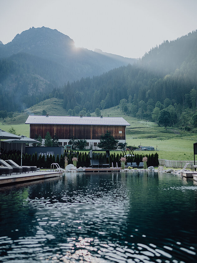 The mountain lake pool at the Lürzerhof Wellness Hotel in Salzburg