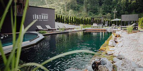 The outdoor pool in the adults-only area at the Lürzerhof wellness hotel in Salzburg