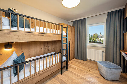 The children's room in the Mountain Family Plus family suite at the Lürzerhof